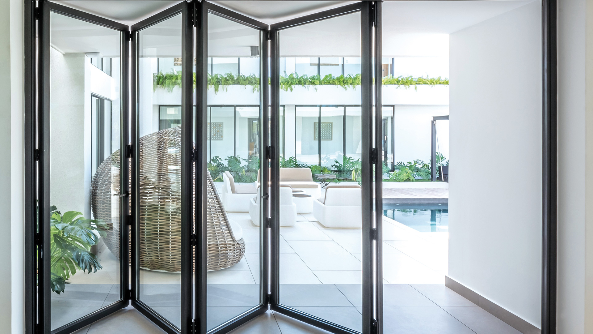 Essex Window and Door Centre can help you design your own bespoke  bi-folding or sliding doors